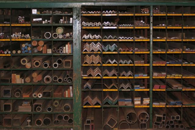 metal fabrication materials on shelves.